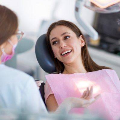 Woman asking her dentist questions in Fountain Valley