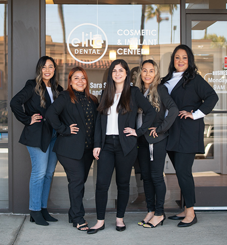 Fountain Valley dental team members standing in front of Elite Dental of Fountain Valley dental office building